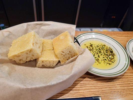 Bread and olive  oil .