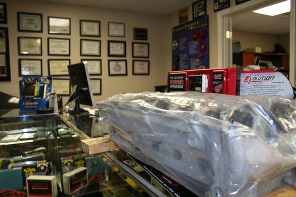 BMW cylinder head on the counter in the showroom