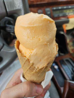 Double scoop of orange sherbet