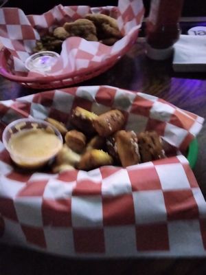 Pretzel bites Chicken strips and fries