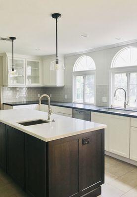 Toluca Lake Classic, shaker painted white cabinets, paired with a dark brown island make this home look timeless.