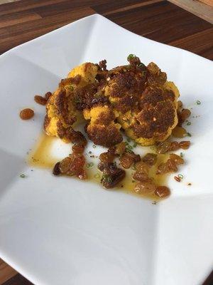 Cauliflower, pickled golden raisons, sweet ancho chili sauce.