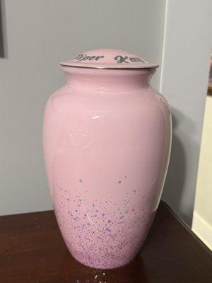 My daughter's urn fit for a princess!!! The sparkles don't show up as well in the photo but they are incredible!!