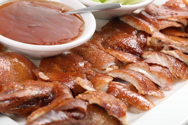 Peking Duck, slow-roasted fresh in-house daily, served with steamed buns and our homemade plum sauce