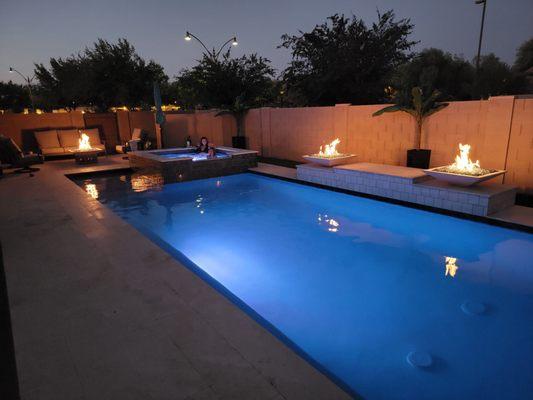 Enjoying the pool and spa in the evening with the 3 fire bowls