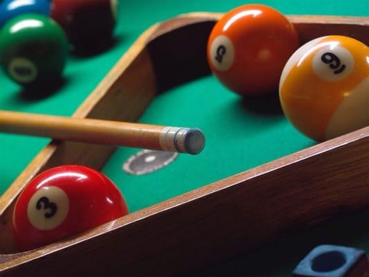 4 pool tables, and indoor cornhole!