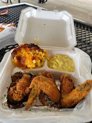 Chicken wings Mac n cheese and potato salad.