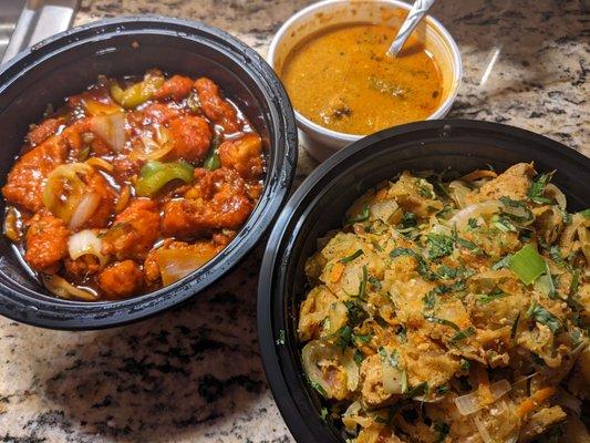 Food to go: chilli curry (red), kothu roti (bottom right), which came with chicken curry (top) to top it with.