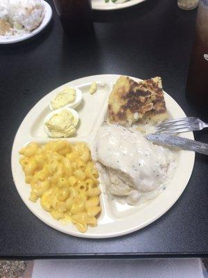 Mac n cheese, chicken fried chicken with gravy, deviled eggs & corn bread