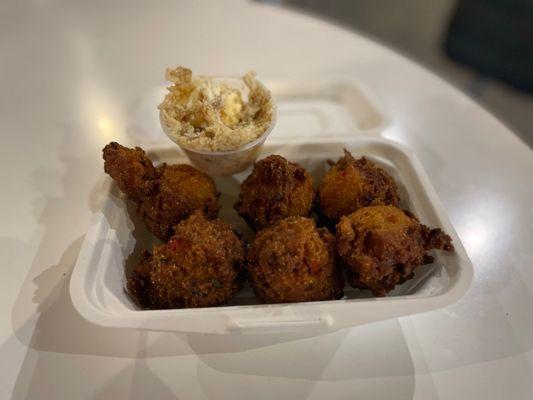 "Golden Snitch Hush Puppies" (golden fried hush puppies served with candied walnut and rum honey butter")