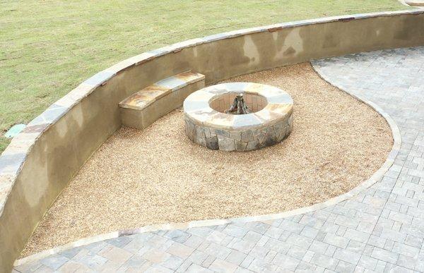 Firepit with edging stone and retaining wall