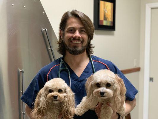 Dr. Lera with his dogs, Ginger & Ruby