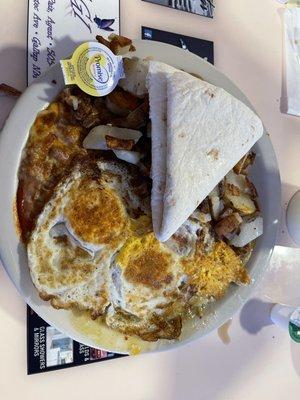 Cheese Enchilada Breakfast with Red and Green Hatch Chile Sauce, beans and home fries!  YUM!