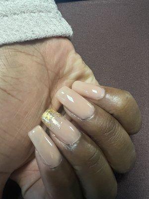 Nude apres nails with gold flakes