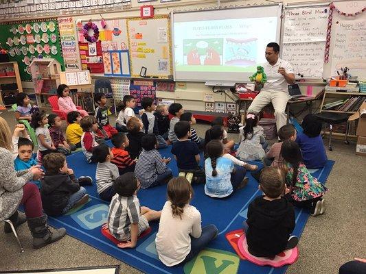 Dr. Dinh teaching Plavan Elementary students how to care for their teeth.