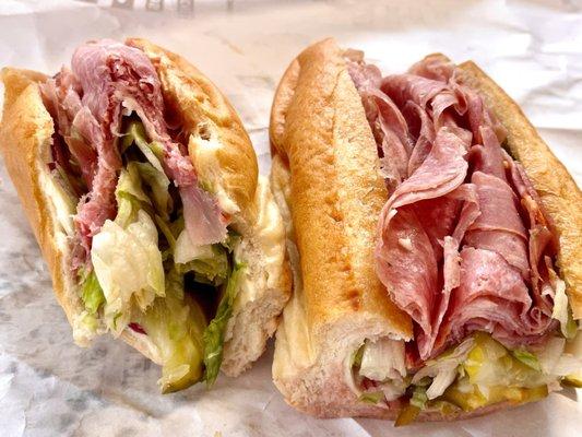 Italian combo on sub roll with lettuce, onions, pickles, vinegar and hot peppers