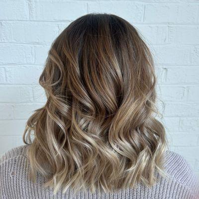 Master Stylist, Lindsey, is the queen of color transformations. Whether she's creating a highlighted blonde, or dramatic ombre style...