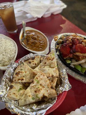 Lamb curry with cashew sauce, Garlic naan bread, and half a tandoori chicken.