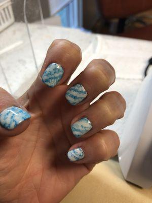 Gel mani.  Looks like marble. Unbelievable.