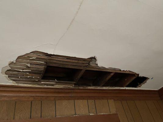 ceiling damage in living room from leaking roof