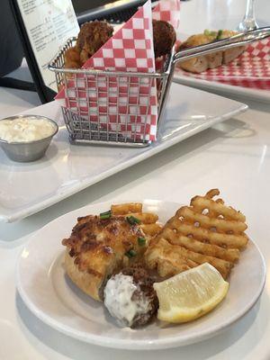 Mini crab cakes and crab pretzel. Waiting on a flight.