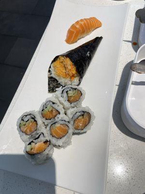 Salmon cucumber roll and spicy crab hand roll