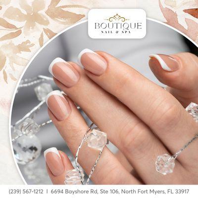 Simplicity meets elegance with this chic nail design. The soft nude tones paired with subtle white accents create a timeless look