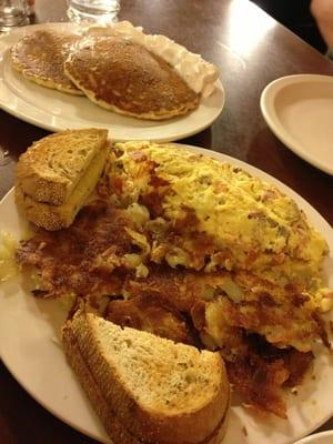 Blueberry pancakes and a crazy omelette at 1AM.