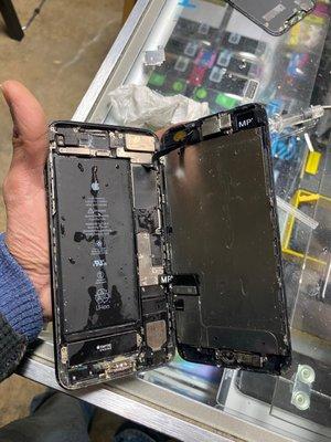 Water damaged iPhone 7 Plus before water damaged treatment.