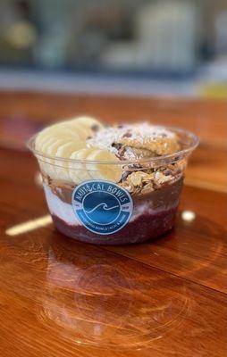 Andrew's Special bowl! Acai, Coconut & Cacao topped with granola, pb, 'nanas, cacao nibs & coconut flakes!