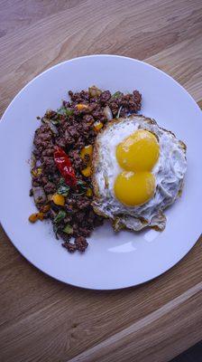 Krapow Wagyu beef with twin fried eggs.