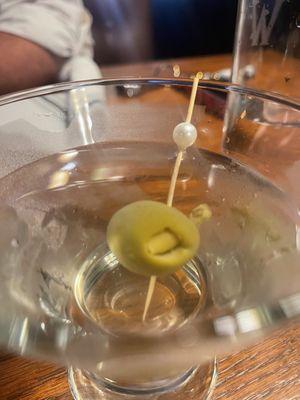 Ranks in my top three dirty martinis. Pretty sure there was a Vermouth wash, but the ginger stuffed olive added a fragrant note.