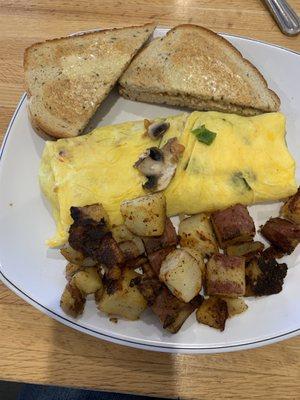 The Veggie Omelet with home fries!