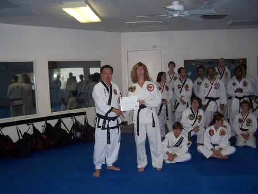 Your Yoga Instructor Dixie Metz with Grandmaster Kimm(yes she is a Black Belt!)