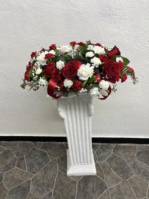 Cremation urn arrangement.