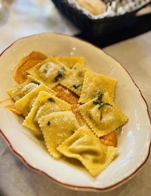 Squash ravioli with sweet potatoe puree