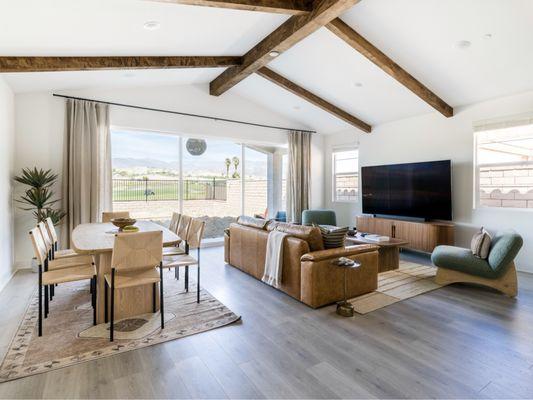 Dining room and living room overlooking golf course