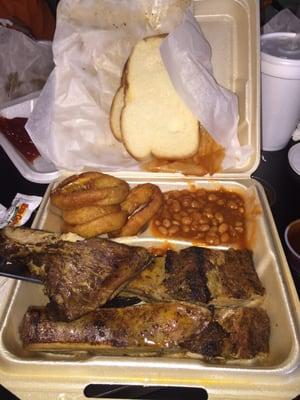 Ribs, Bbq beenz and onion rings. Ribs were great and huge! They come plain with sauces on the side.