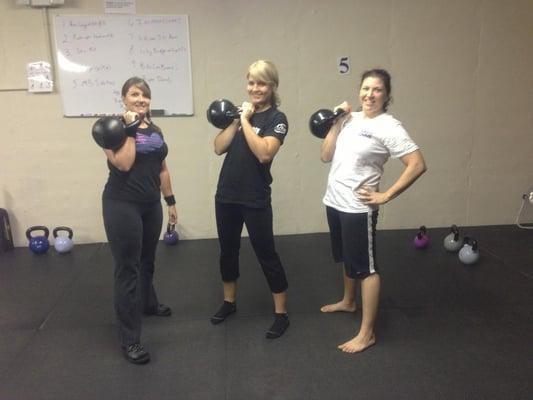 3 of the "iron maiden getup girls"  (girls who can do a getup with a 53lb kettlebell)