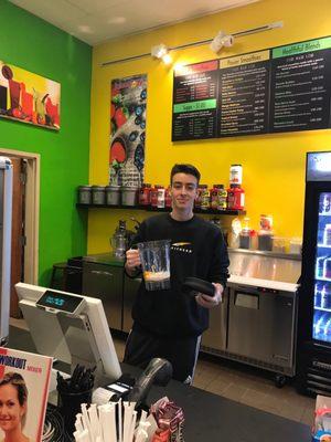 Juice bar with friendly Morgan the owner/manager making one of his healthy specialties