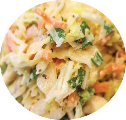 This is our house-made coleslaw. It is dressed in our own house-made "coleslaw dressing".