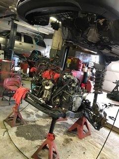 Water Pump Replacement - Had to drop engine for repair.