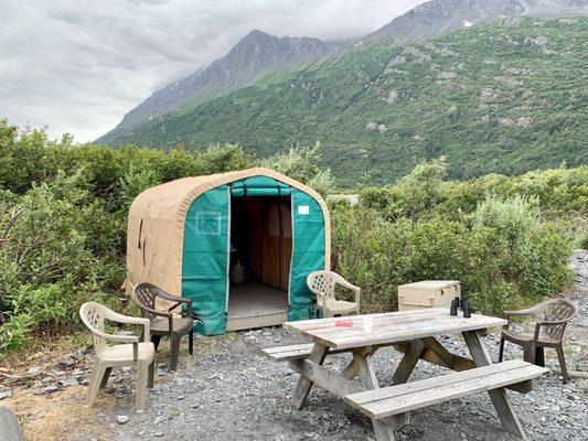 The tent on the Knik River's edge to sit down and have hot chocolate during our 1-hour time on land.