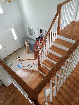 Treads / and landing installed and refinished , railings refinished. risers pickets and trim installed and painted. all done by hawkins