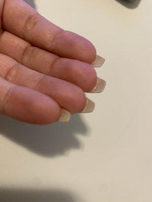 thick glue left under my nails