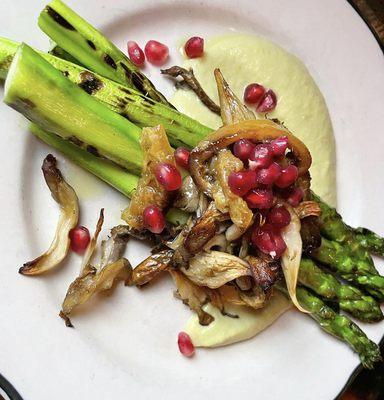 Grilled asparagus with mole blanco, mushrooms & pomegranates