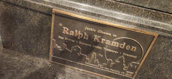 Plaque inscription reads 'Ralph Kramden..Bus Driver..Racoon Lodge Treasurer..Dreamer'