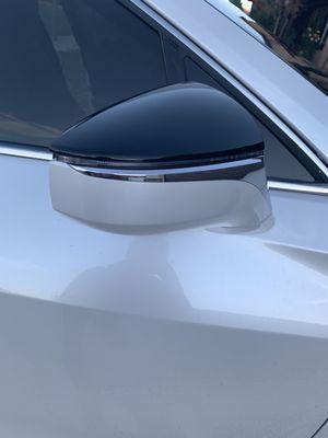 After- replaced side mirror