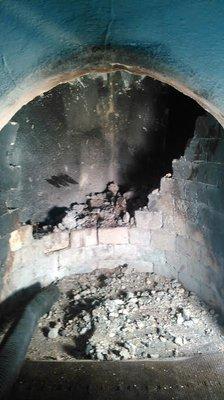 firebox before rebuild. This fireplace was not safe to use until we rebuilt it.