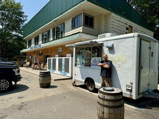 Sam the owner of The Fish Basket which is now located at the Midway General Store August 2024.